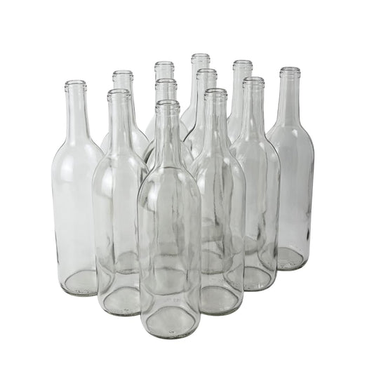 Set of clear glass bottles on a white background
