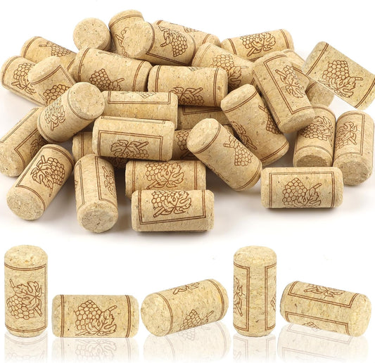 Collection of wine corks with embossed designs on a white background