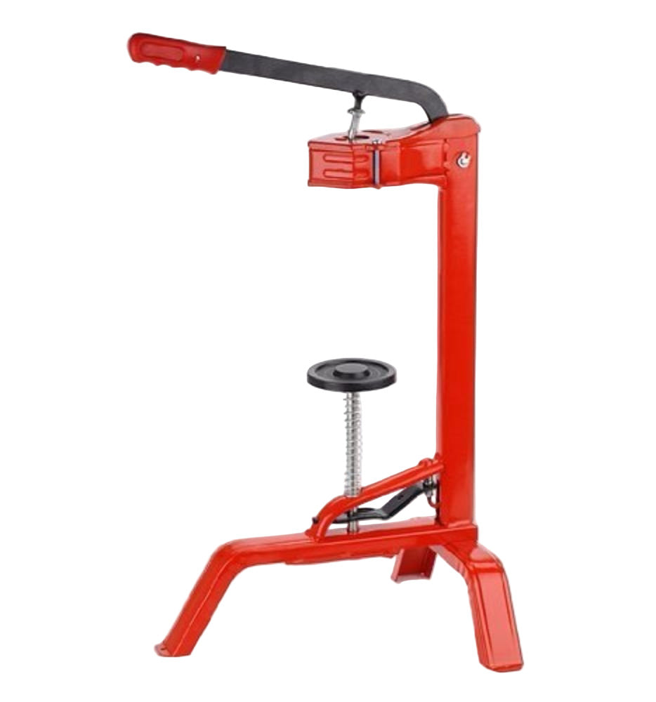 Red manual press tool on a white background