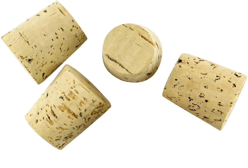 Five natural cork stoppers of different sizes on a white background